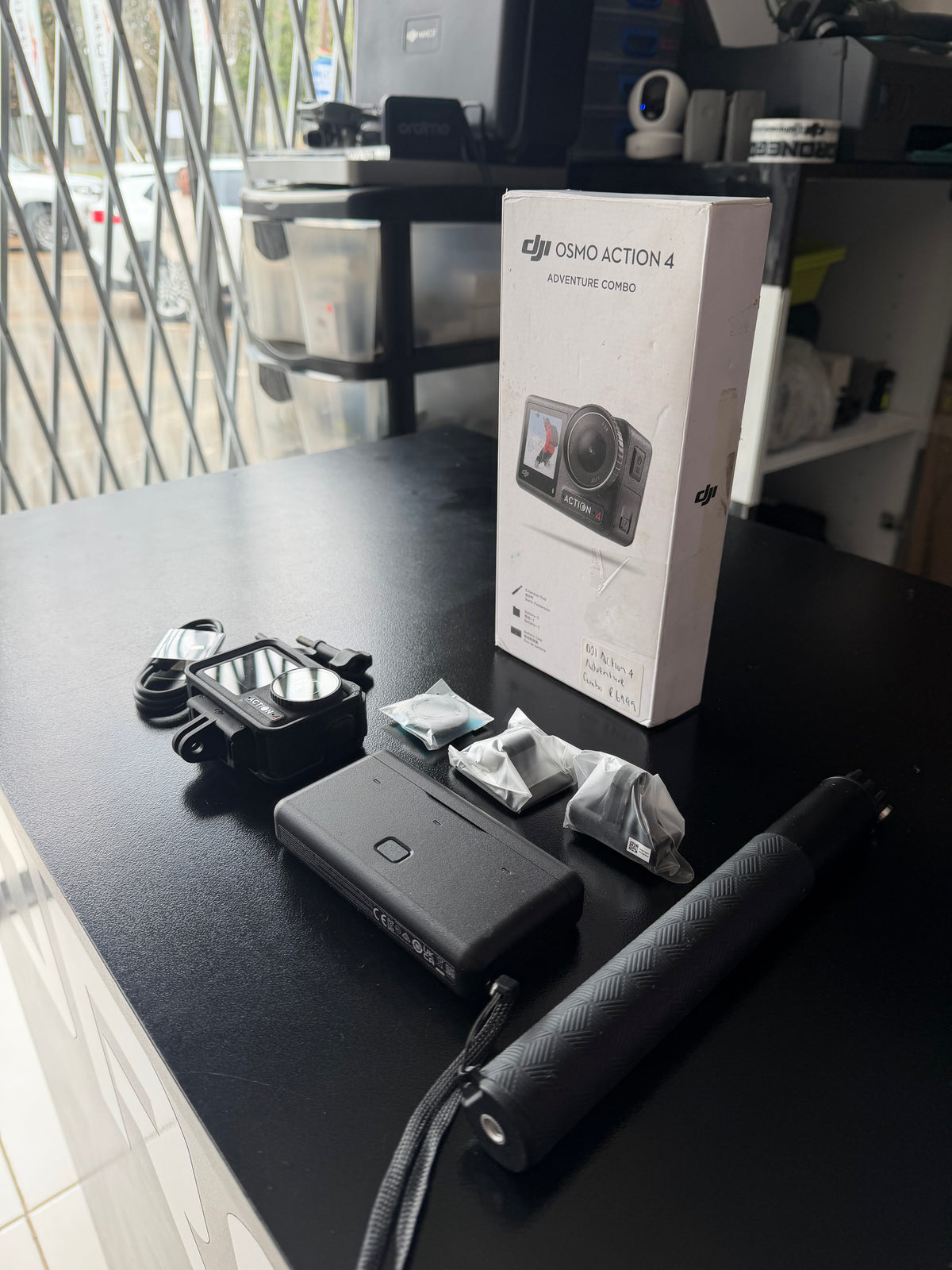 DJI Action 4 Adventure Combo / Pre Owned